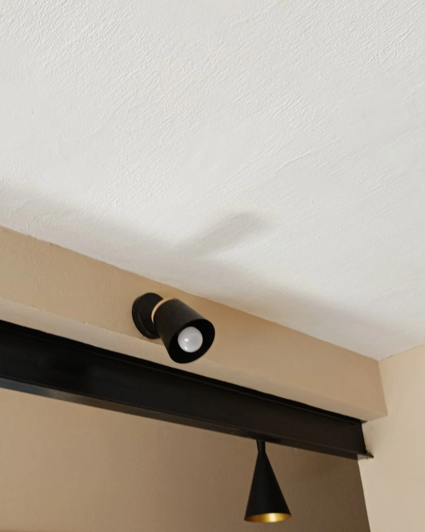 Foco orientable de pared